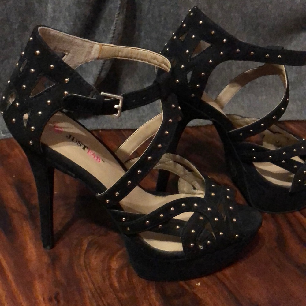 Black heals with gold balls on them